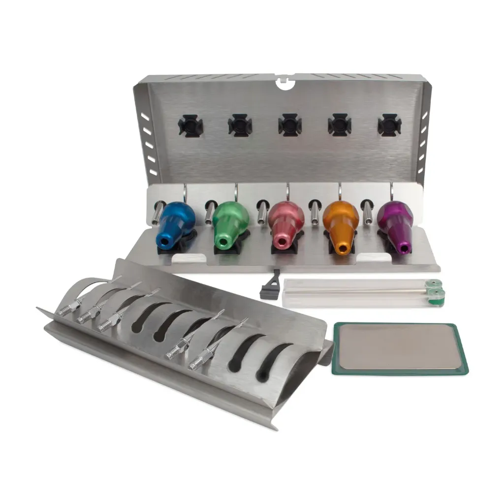 DENTANOMIC Feline Set – Mixed Gold, comprising 3 standard handles (green, blue, and pink) + 2 long handles (purple, orange) + 2 mm and 3 mm elevator blades + 1.5 mm, 2 mm, and 3 mm luxator blades + storage rack + sharpening kit + sterilization container